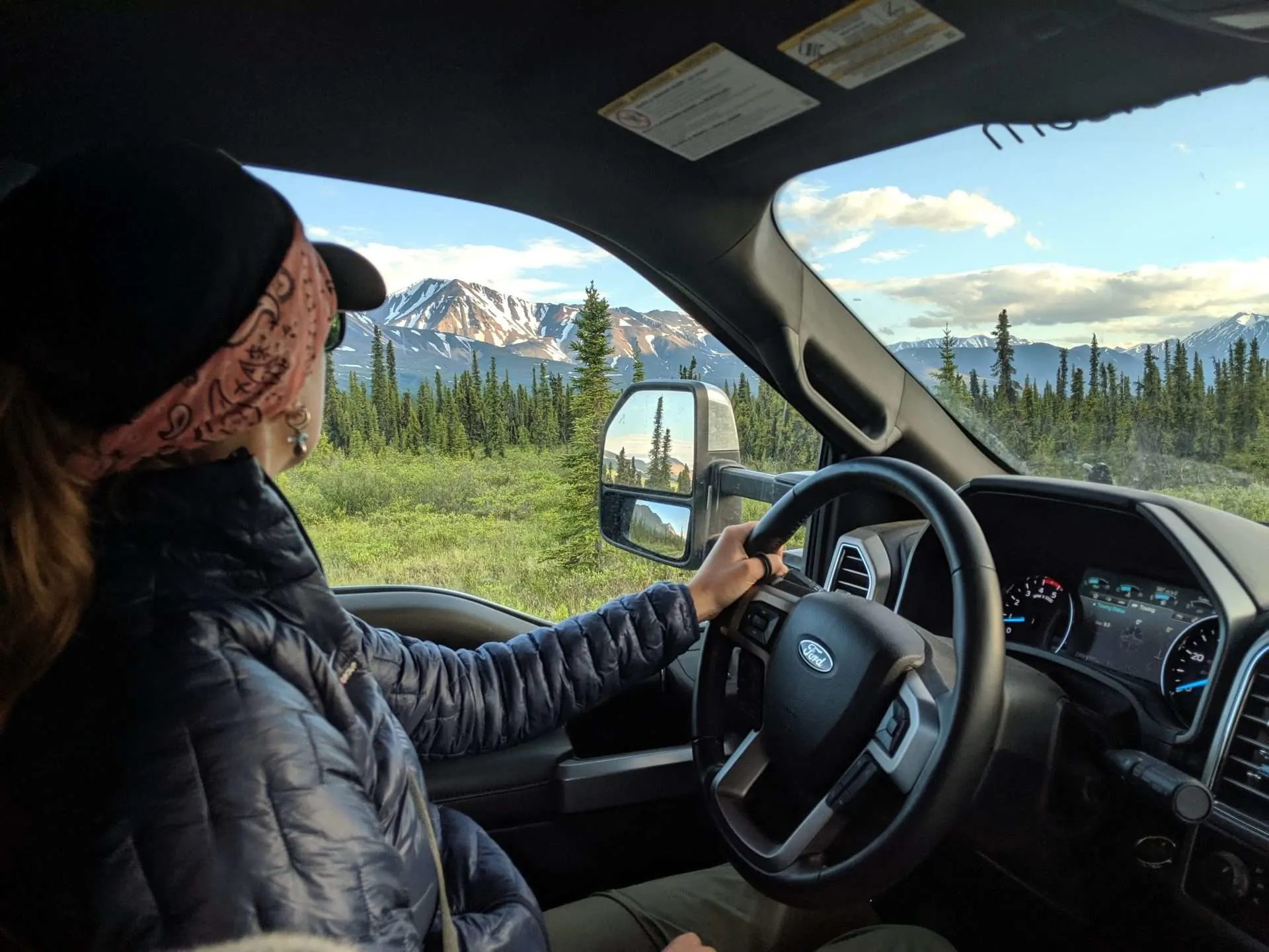 Caitlin from Mortons on the Move driving through stunning Alaskan scenary.
