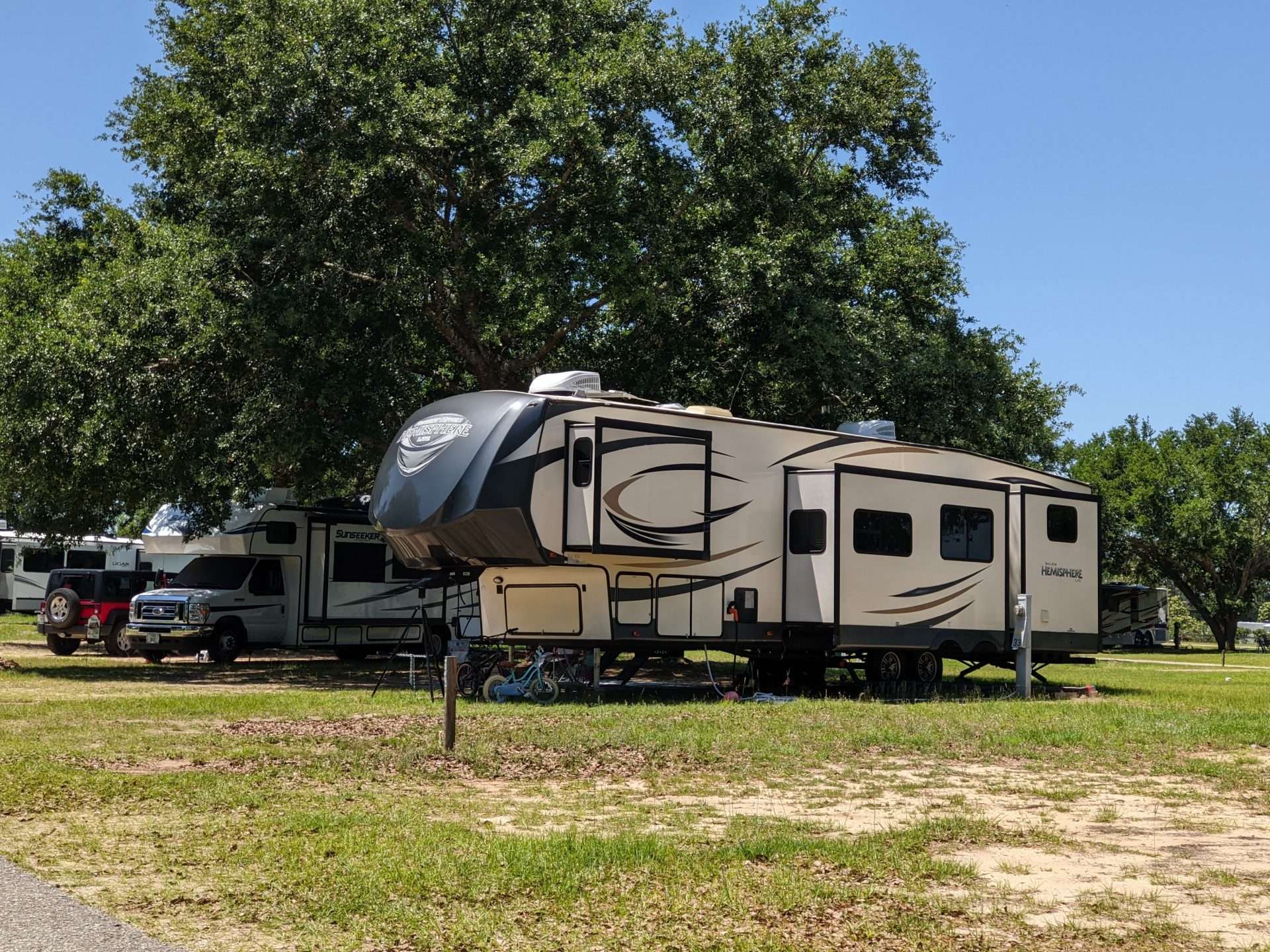 RV parked at busy campsite