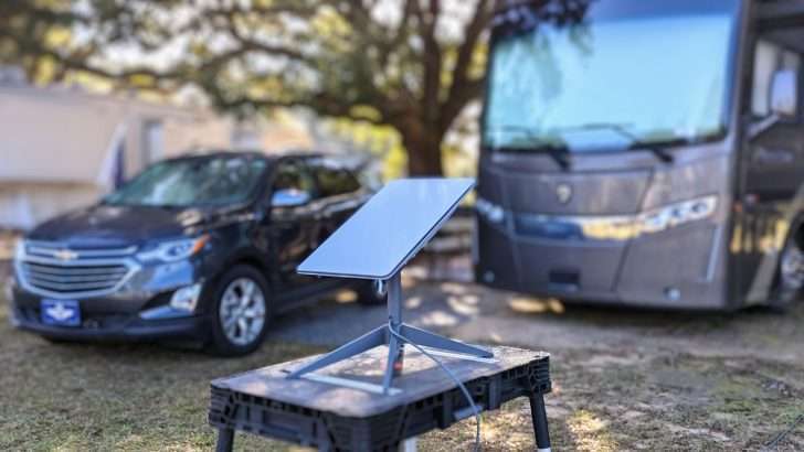 satellite internet dish installed in front of an RV