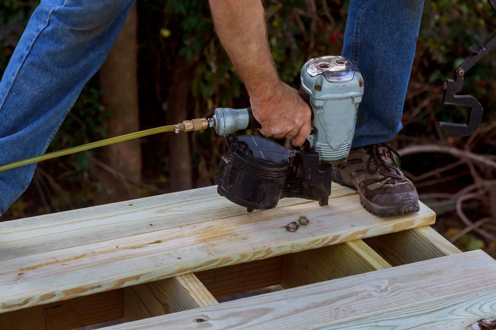 Man building RV porch