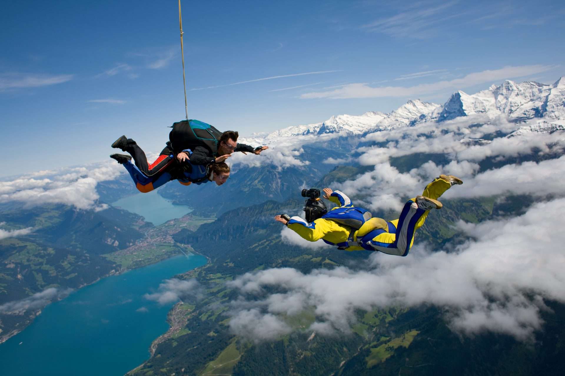 Two skydivers above scenic view
