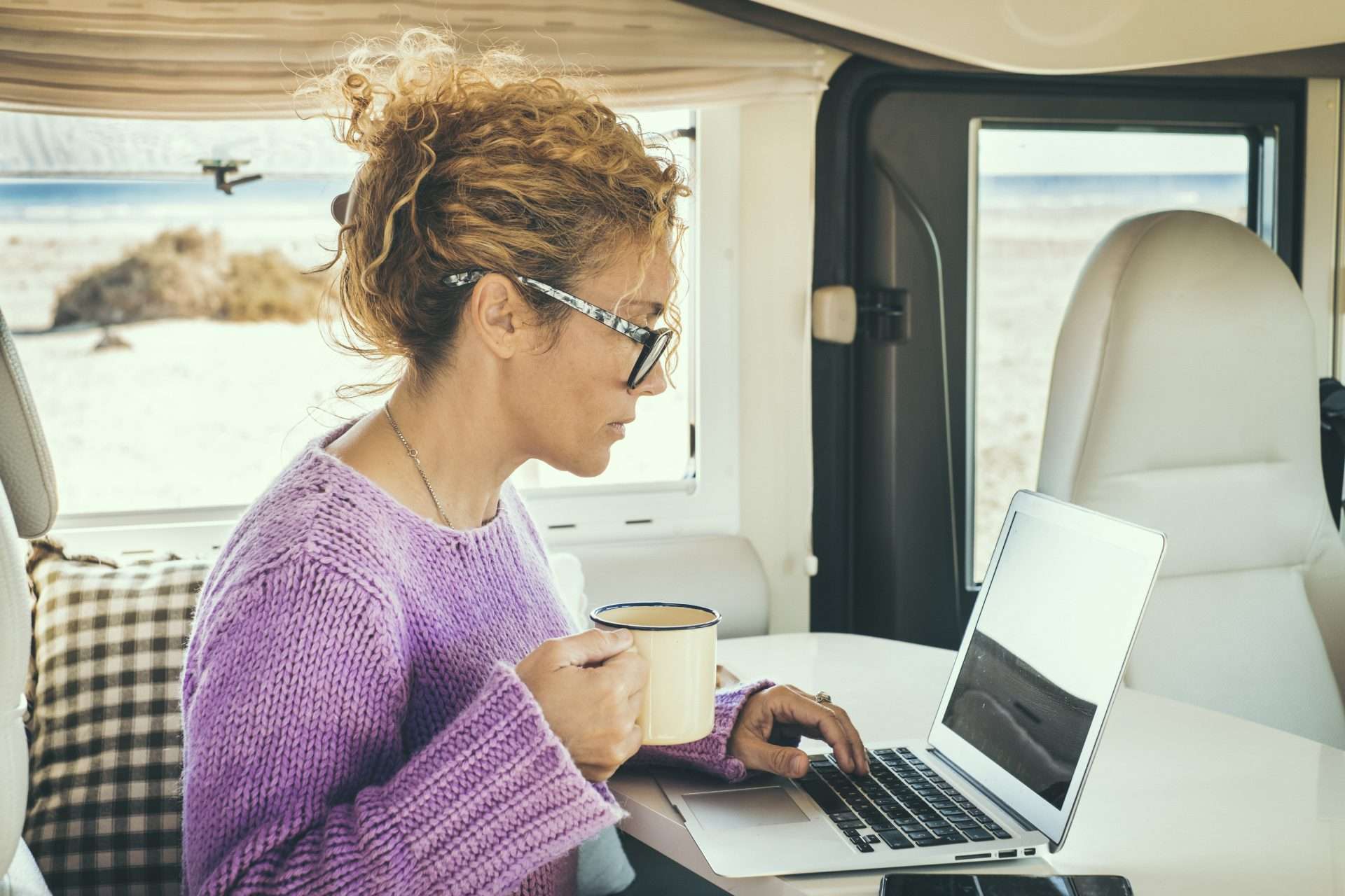 Woman looking up RV owner's manuals online