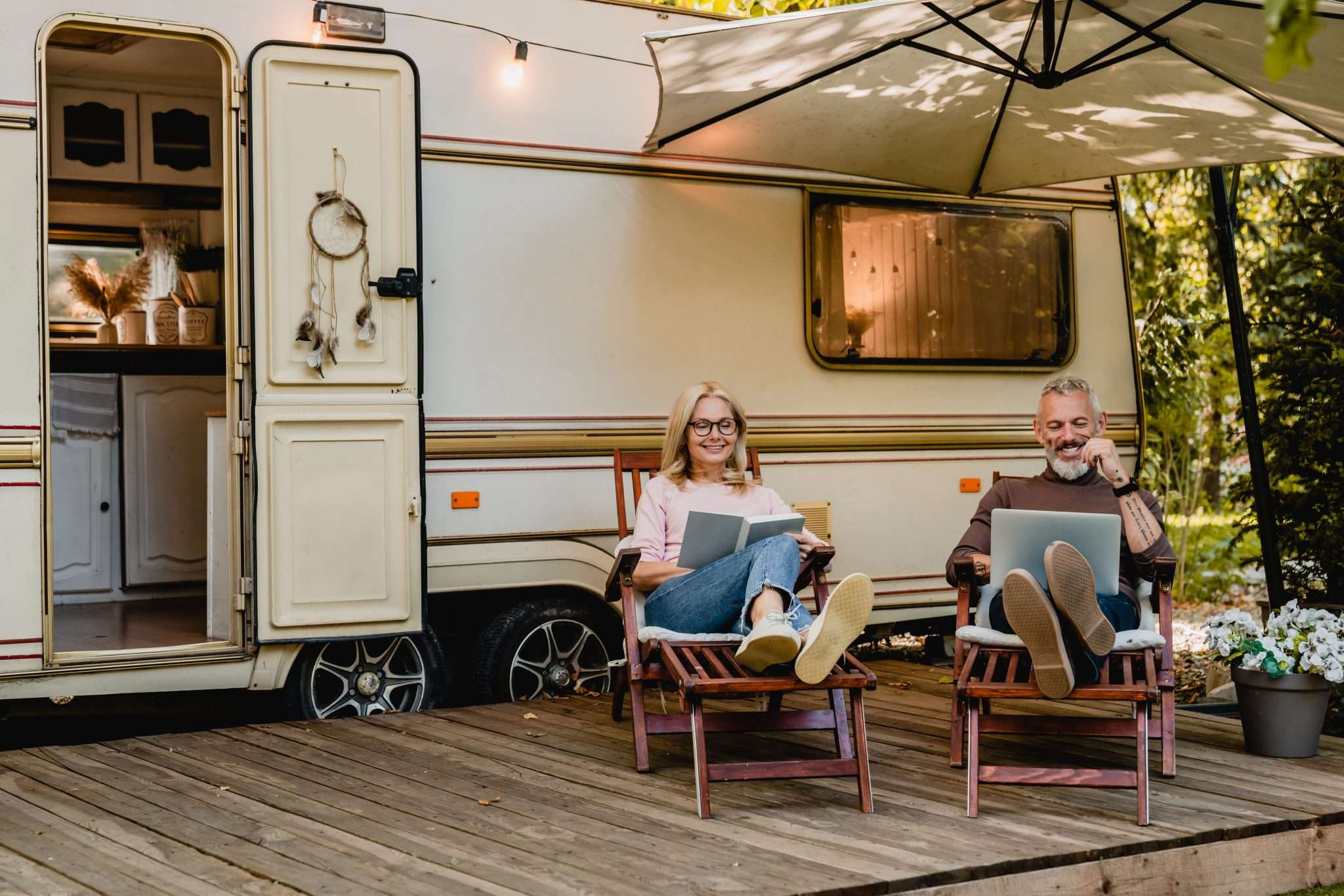 Couple relaxing on RV porch