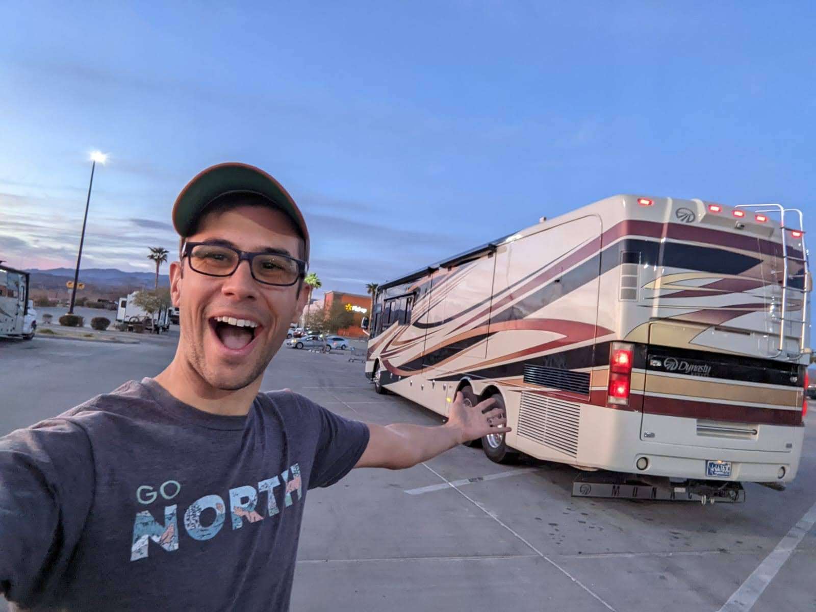 Tom from Mortons on the Move in front of family RV