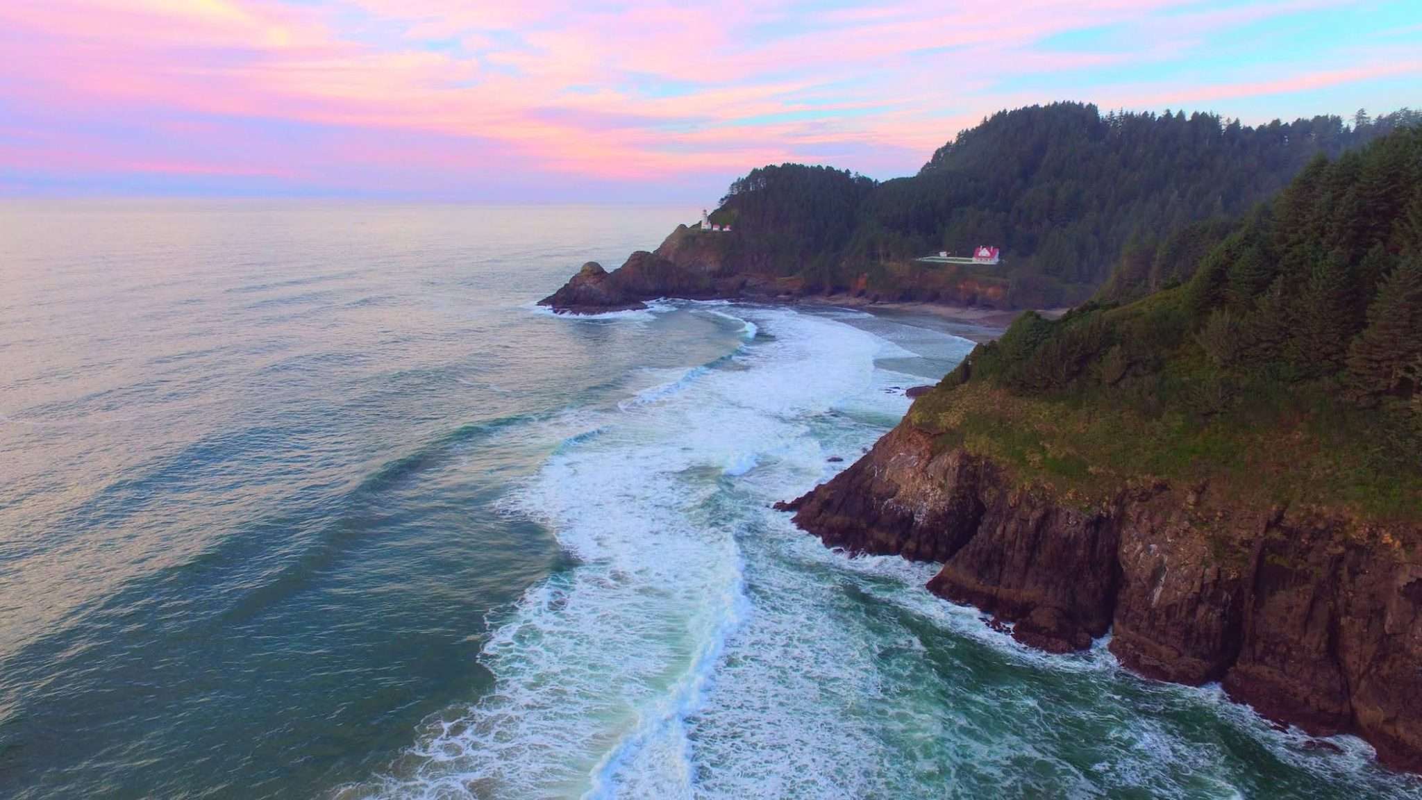 aerial oregon coast with pink sunset