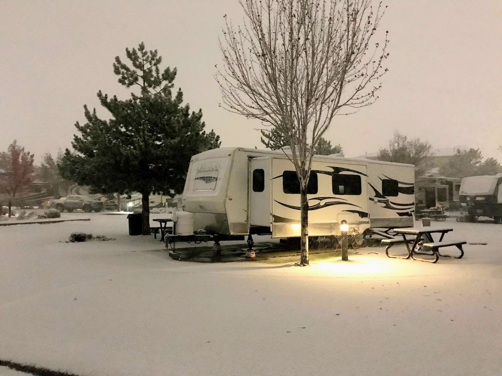 travel trailer camping in the snow