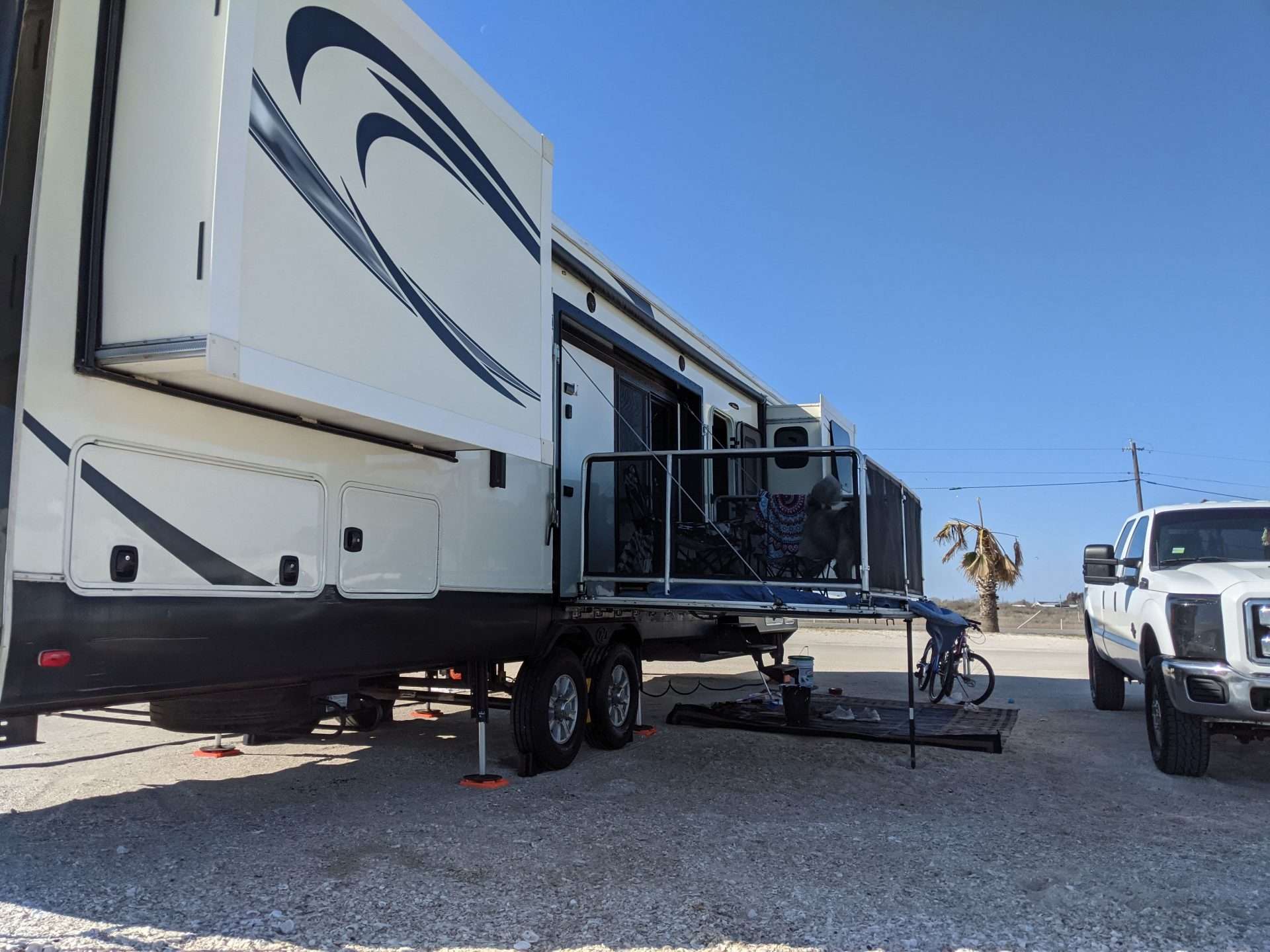 RV parked with leveling jacks installed