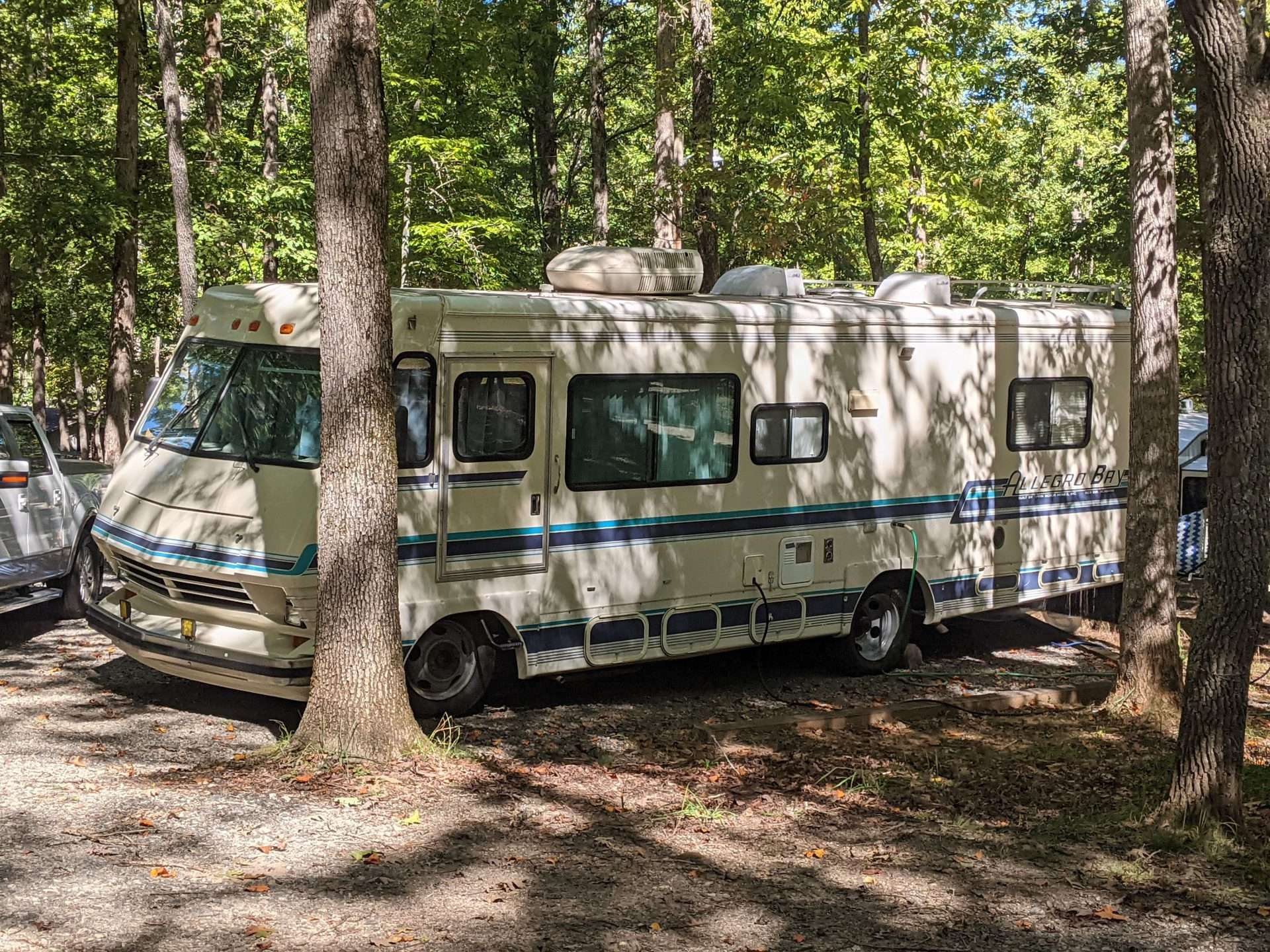 Long Class C Rv parked in state park