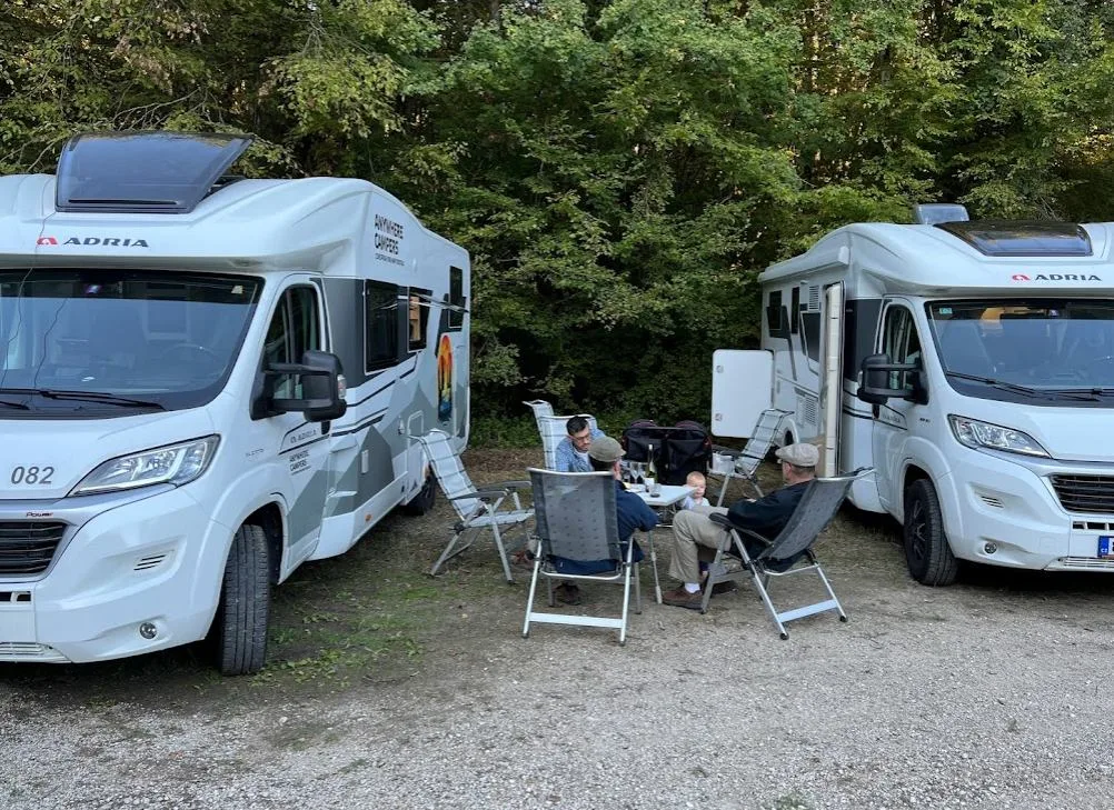 Rental RVs parked at campsite