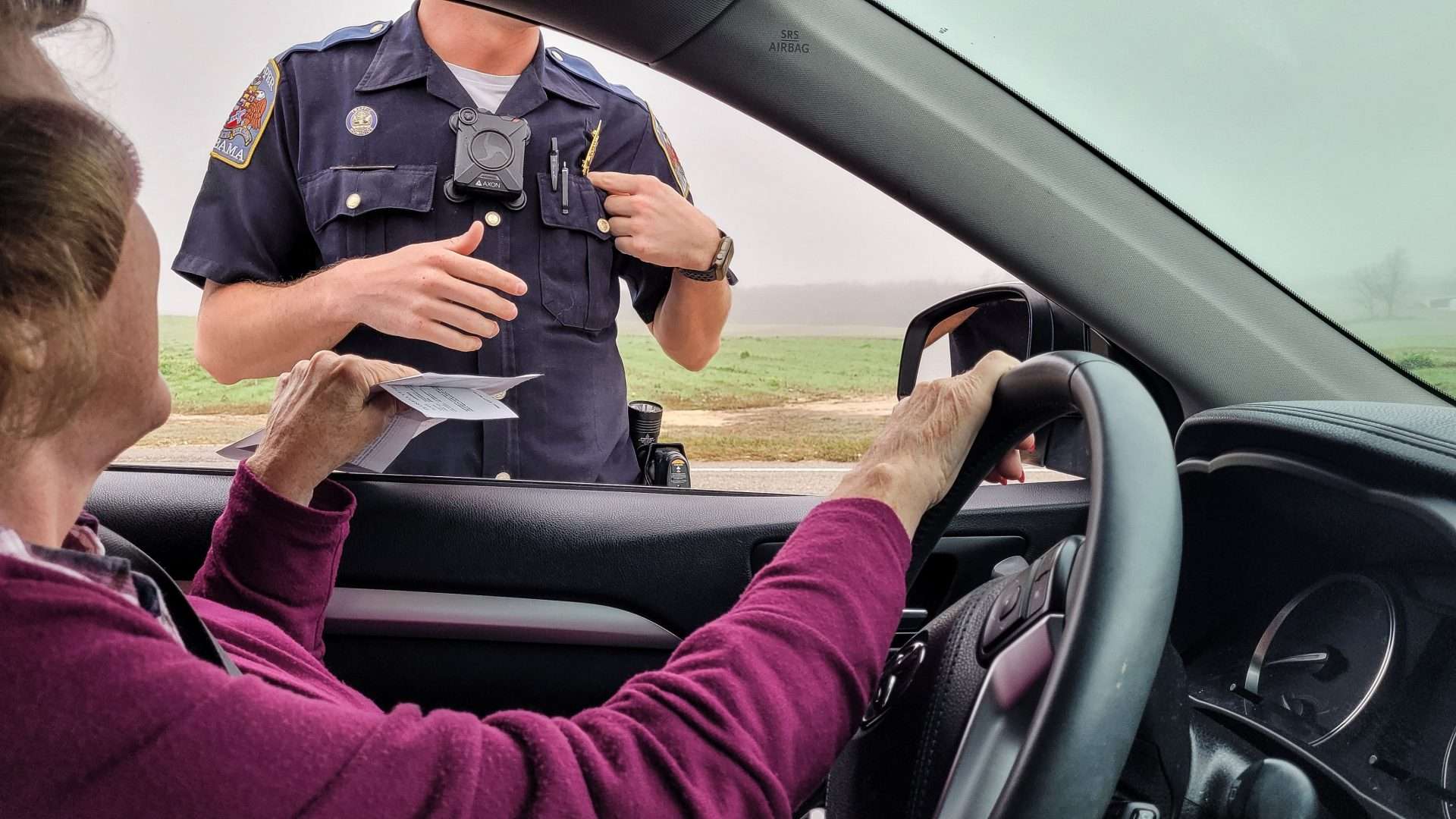 Woman pulled over for a speeding ticket while driving