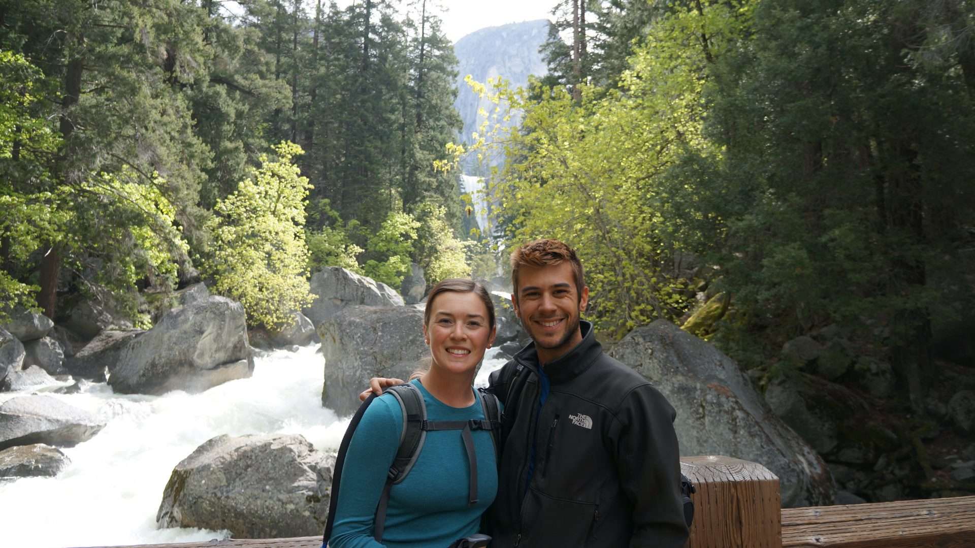 Tom and Cait from Mortons on the move in Yosemite by waterfall