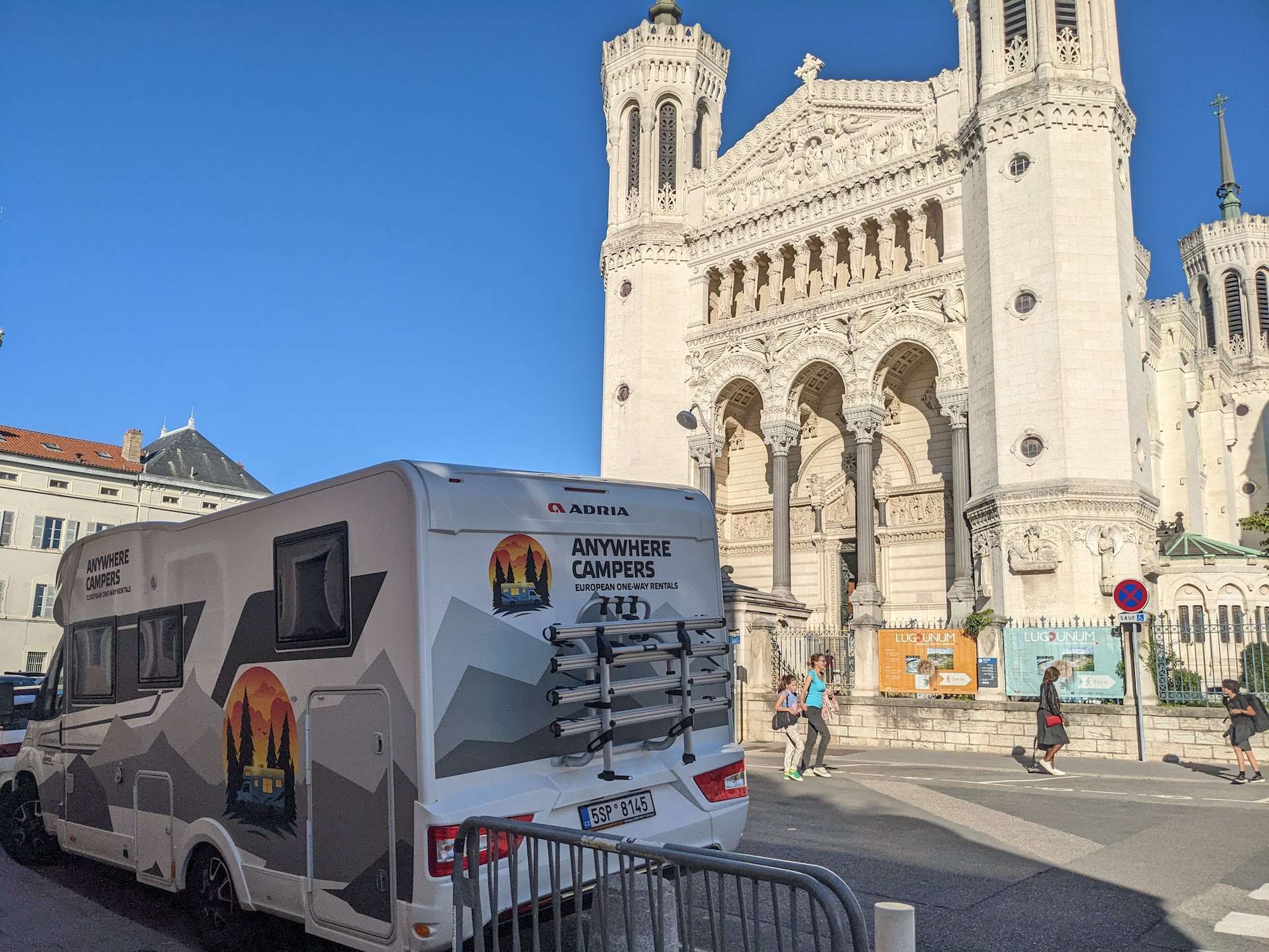 one way camper rental parked in front of french basilica