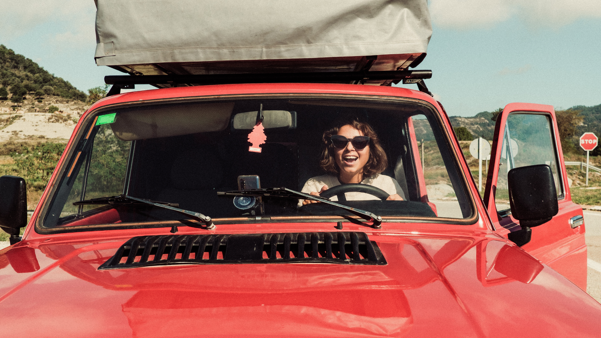 Woman driving truck camper