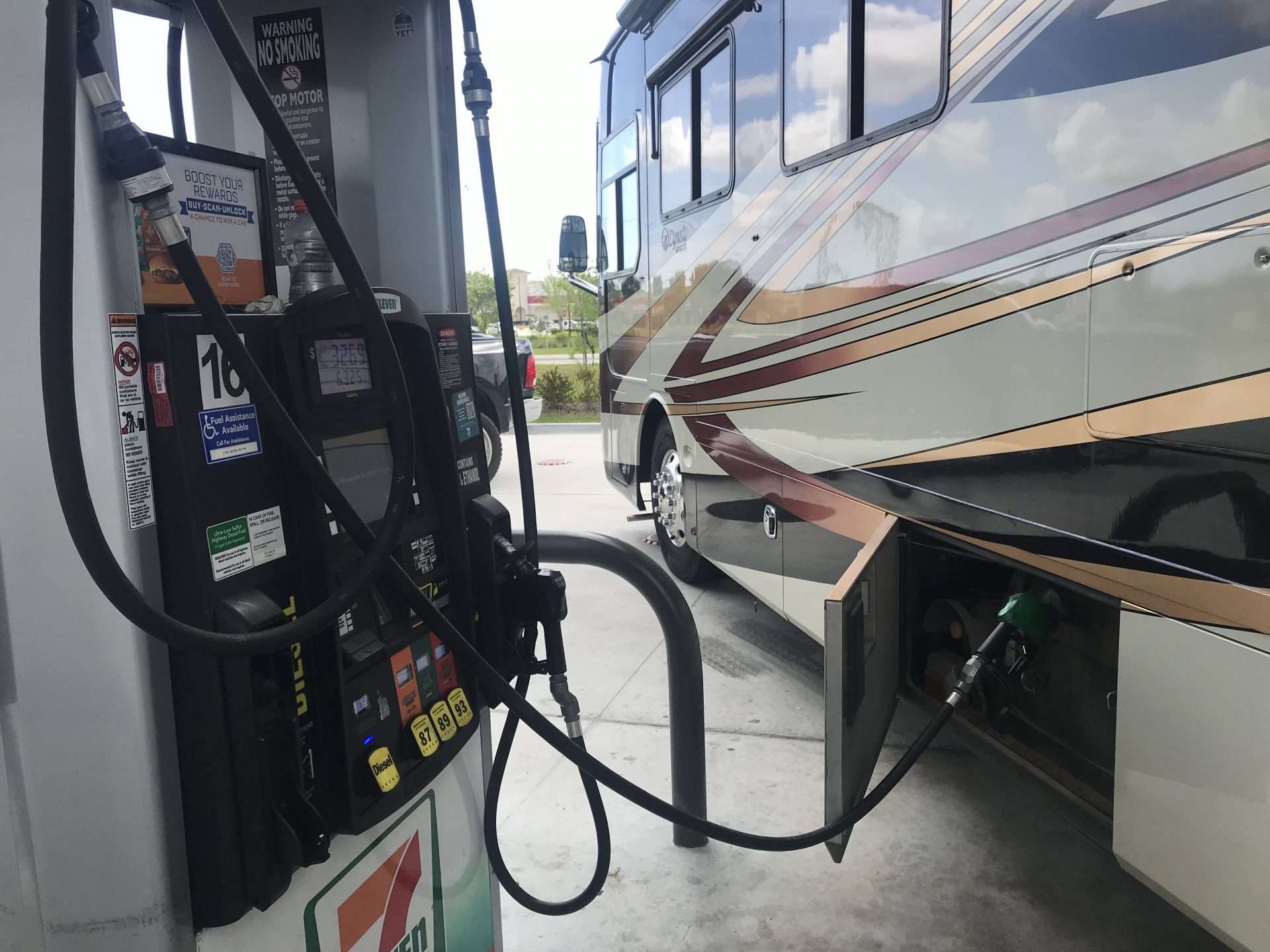 Motorhome being refilled at gas station