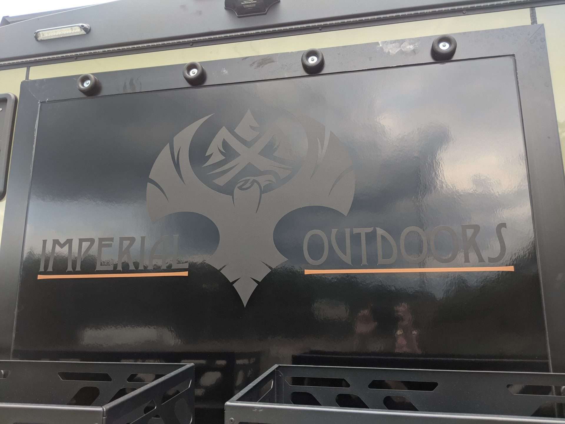 Imperial Outdoors logo on window