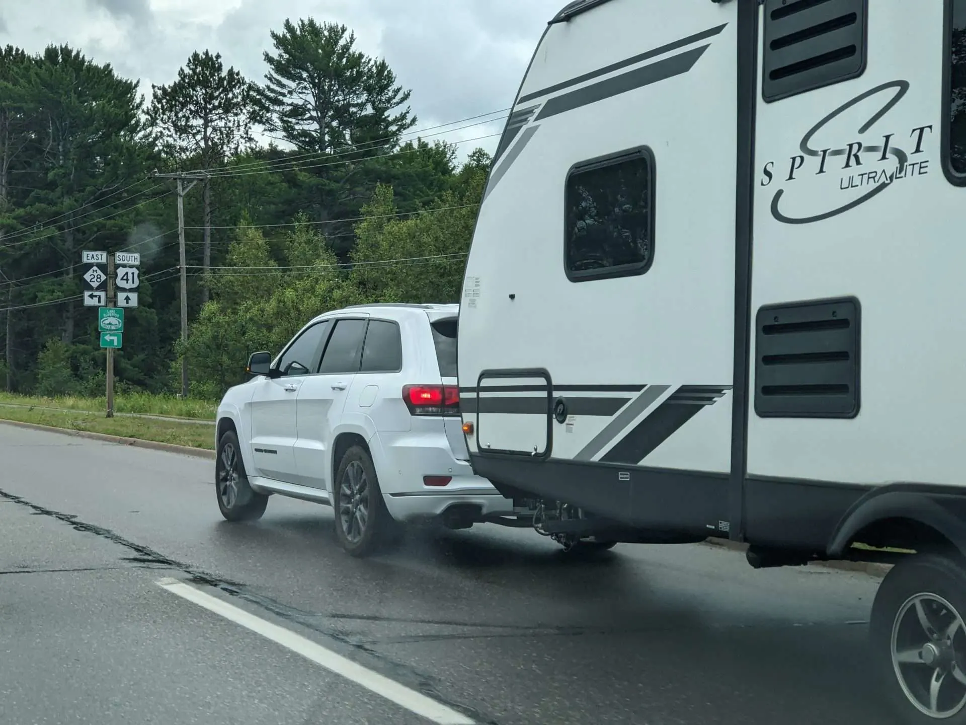 SUV towing travel trailer