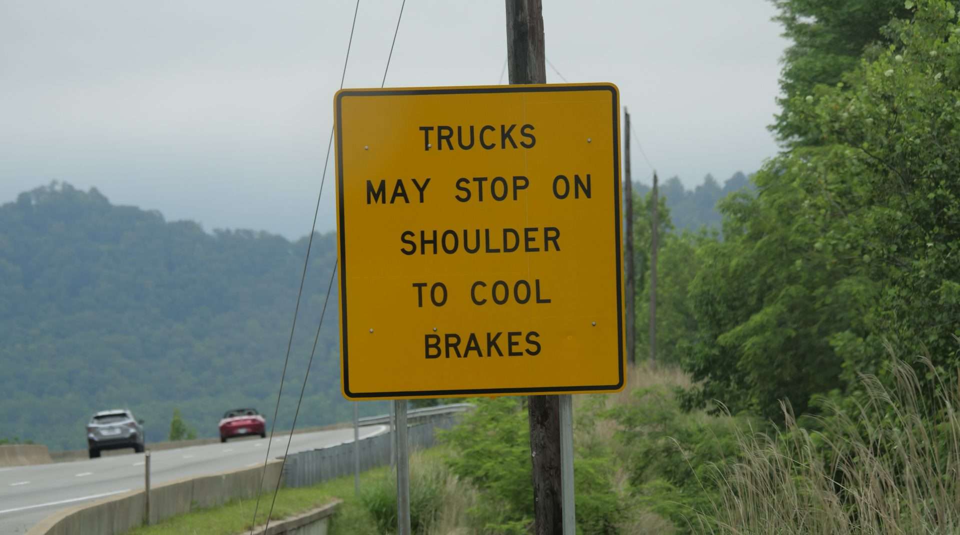 trucks cool brakes sign on highway