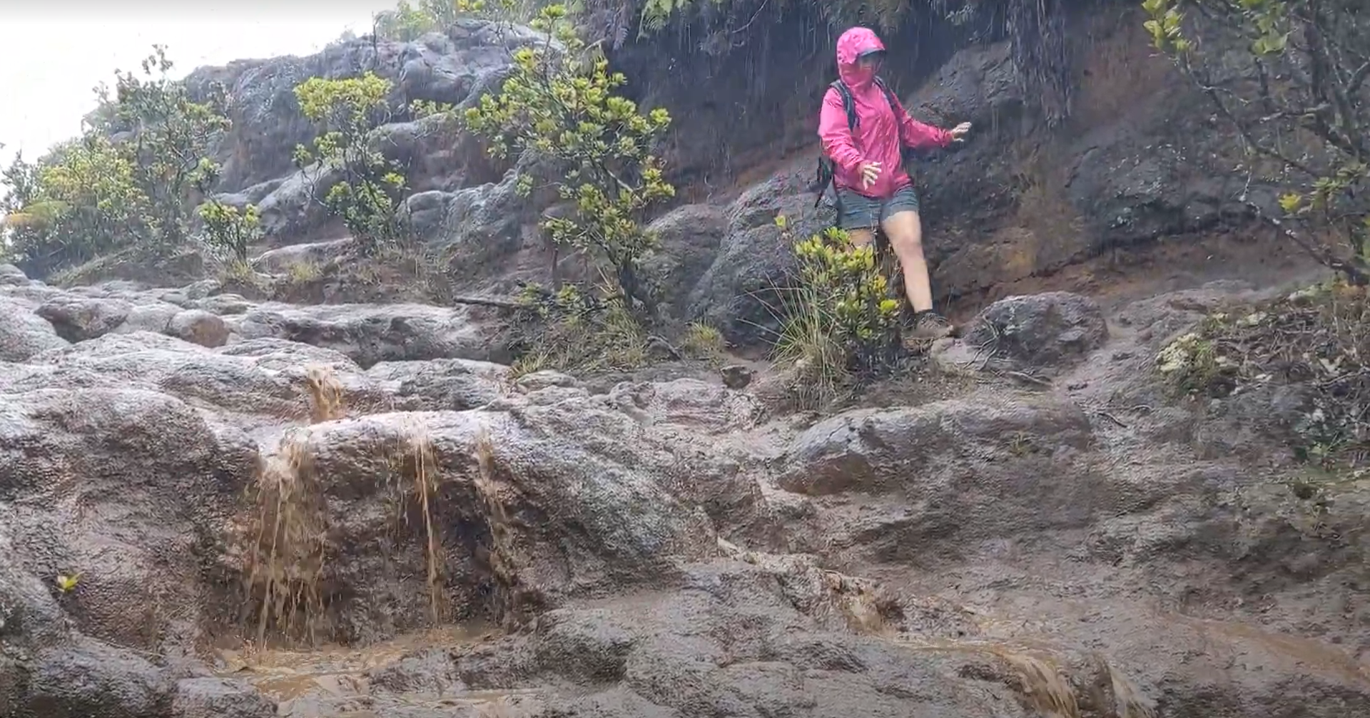 caitlin hiking in mud in hawaii