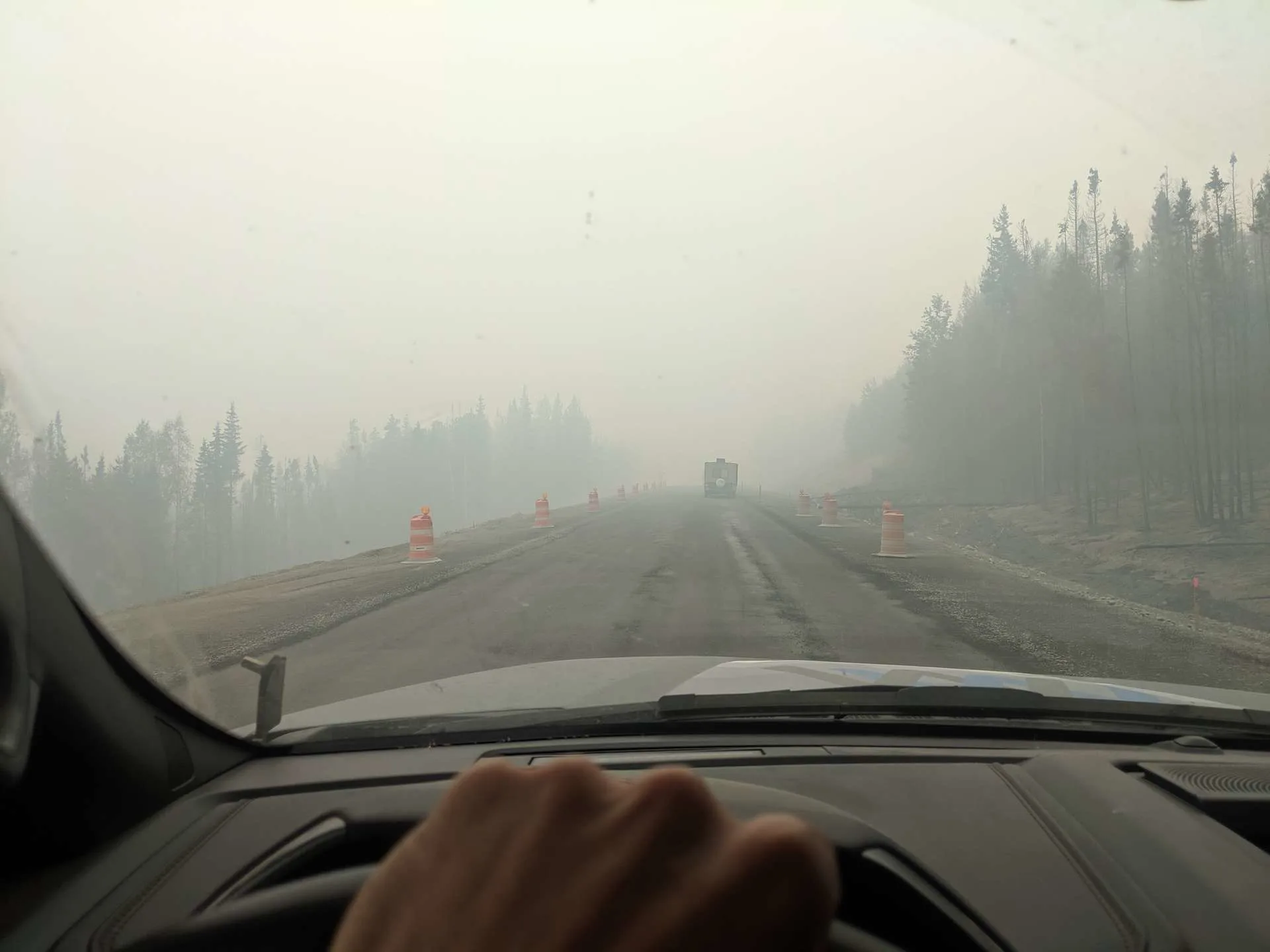 wildfire smoke along roadway