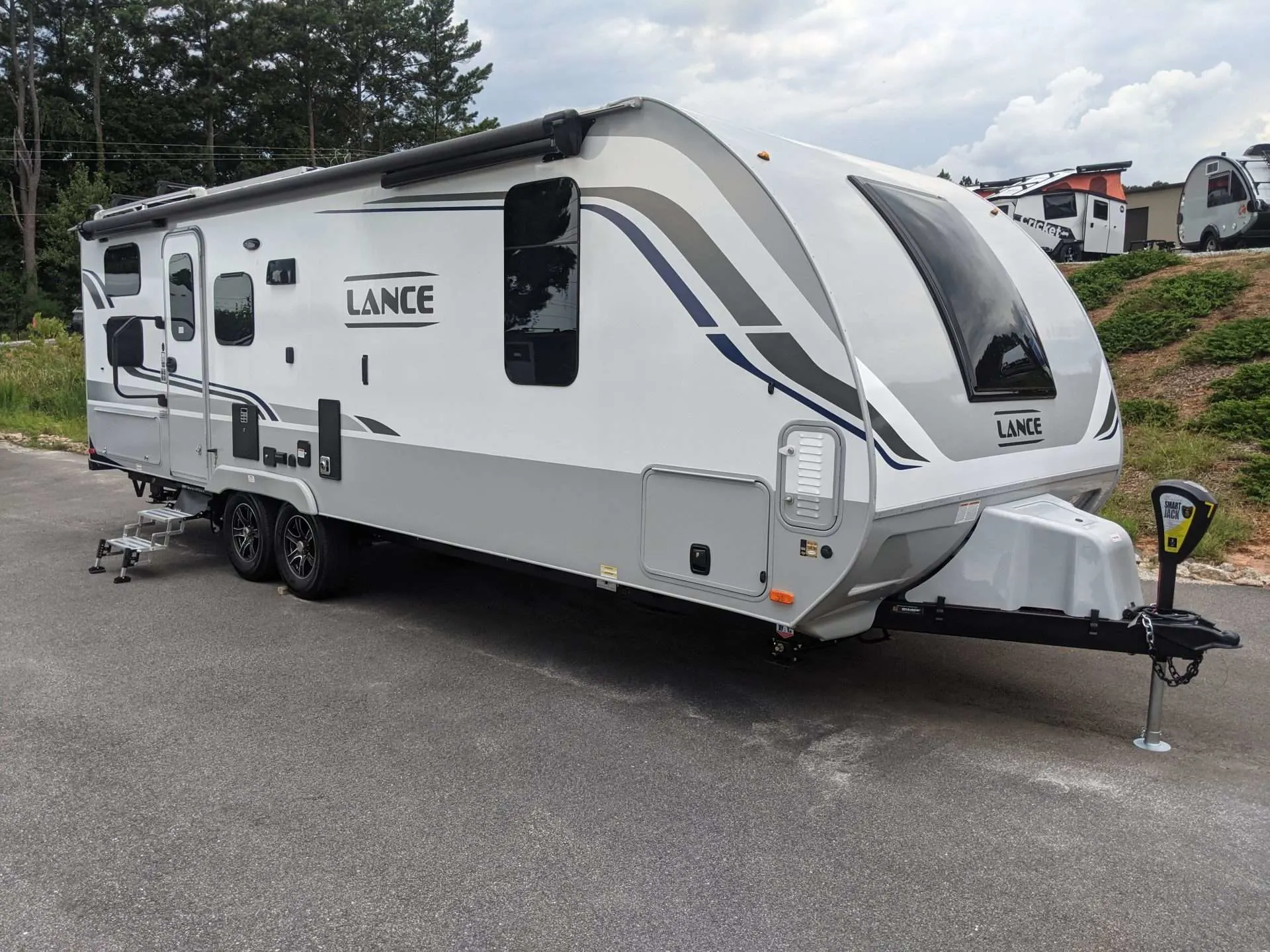 Lance travel trailer in parking lot