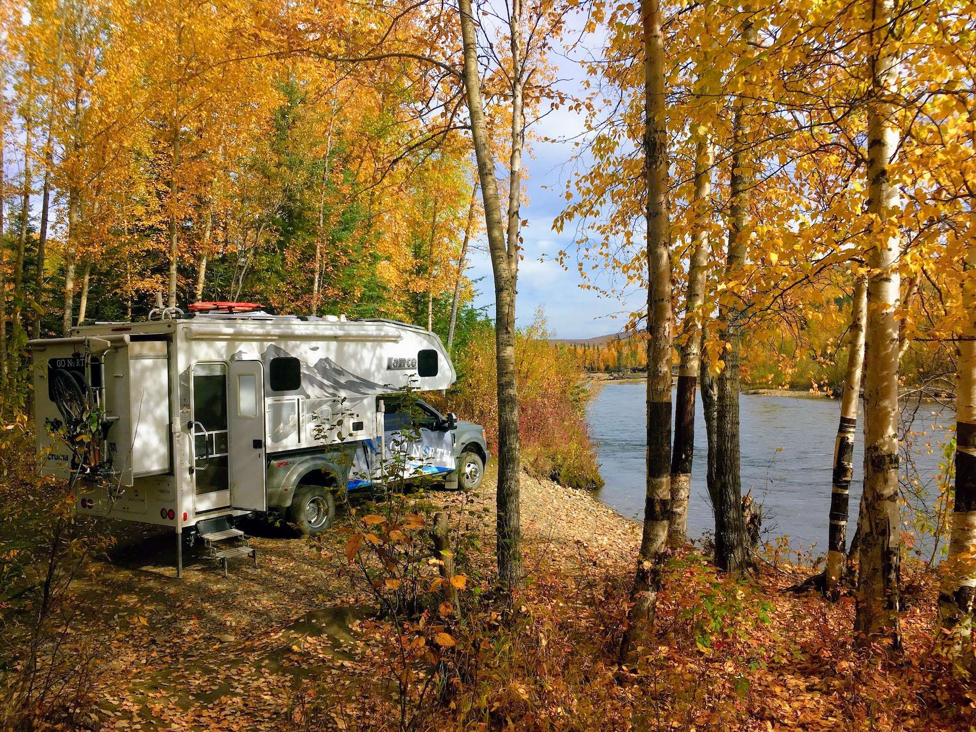 truck camper in fall colors