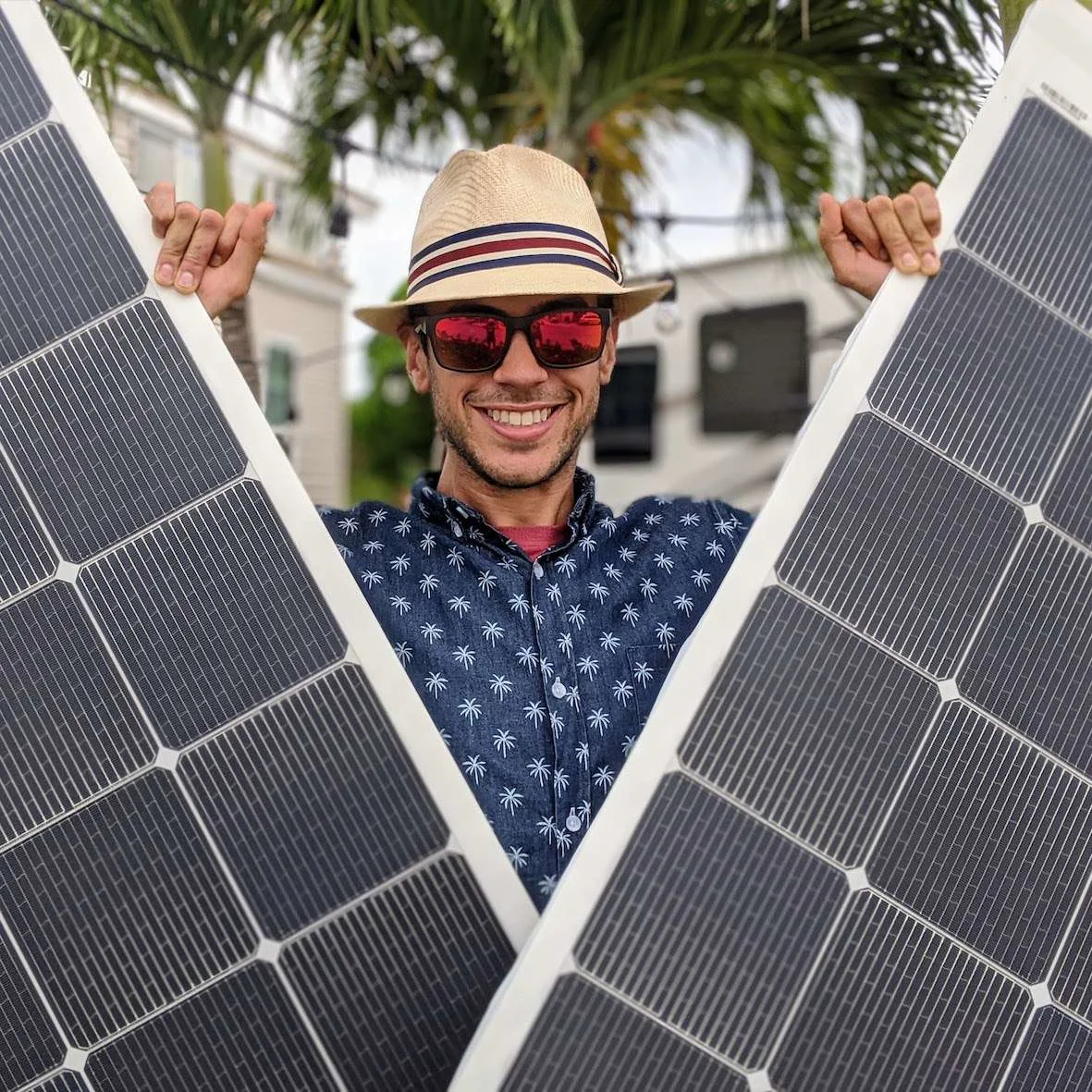 tom holding rv solar panels