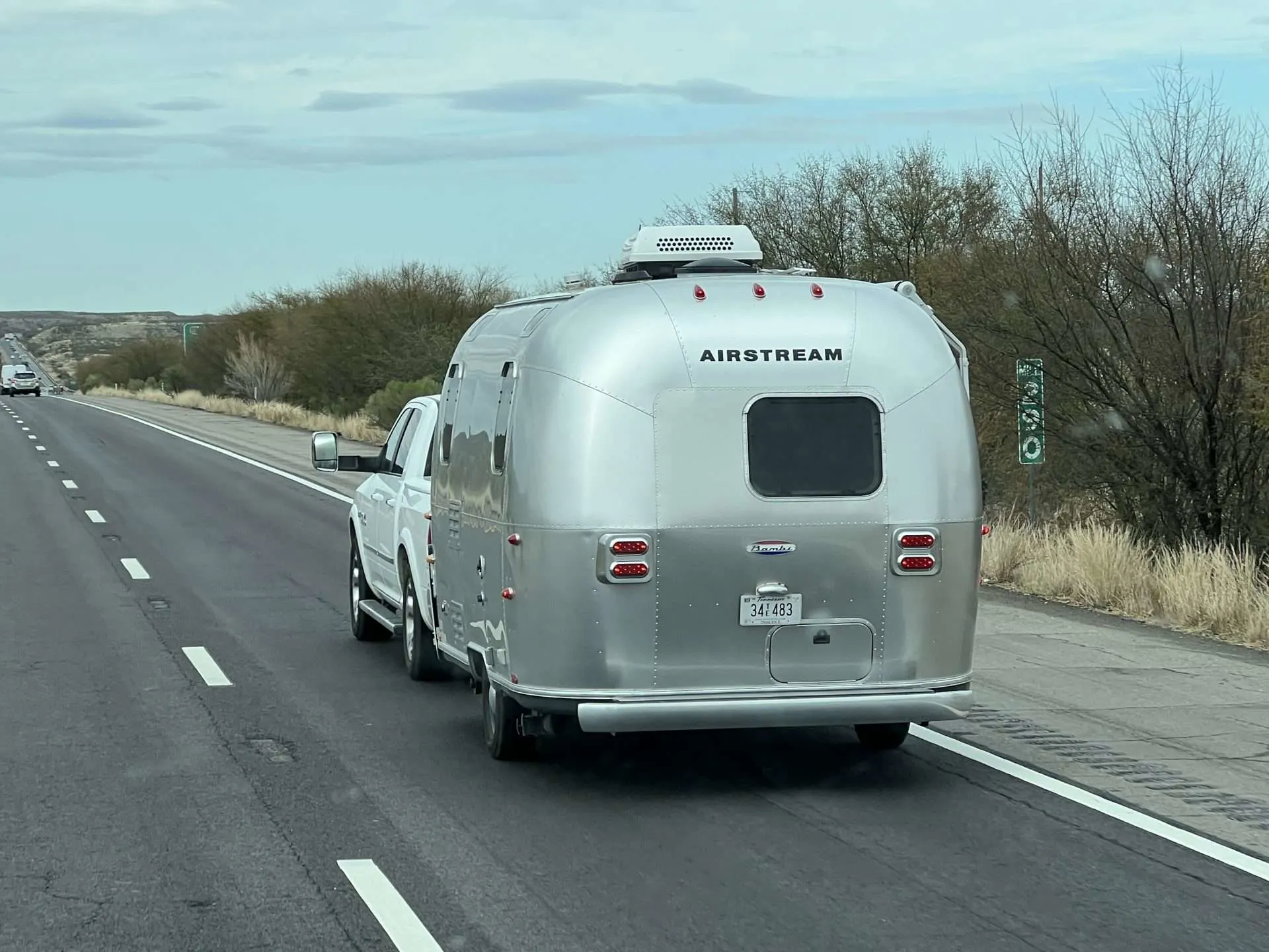 Back of Airstream driving on road